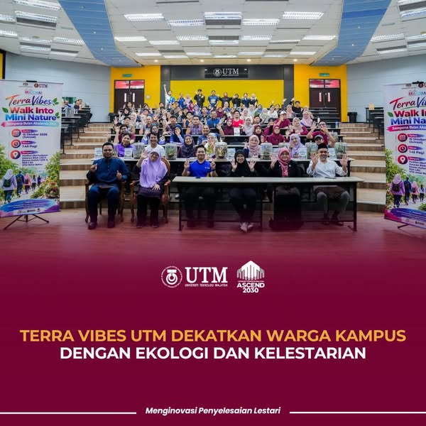 Participants of Terra Vibes: Walk into Mini Nature in a tiered UTM lecture hall, with Terra Vibes banners and small glass terrariums on the front table